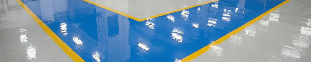 A factory floor professionally covered and marked with epoxy flooring in Gilbert, AZ