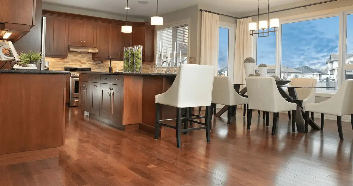 A modern kitchen with professionally installed wood flooring in Gilbert, AZ