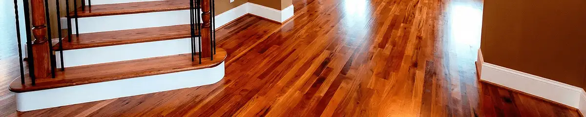 Base floor of a staircase with professionally restored wood flooring in Gilbert AZ