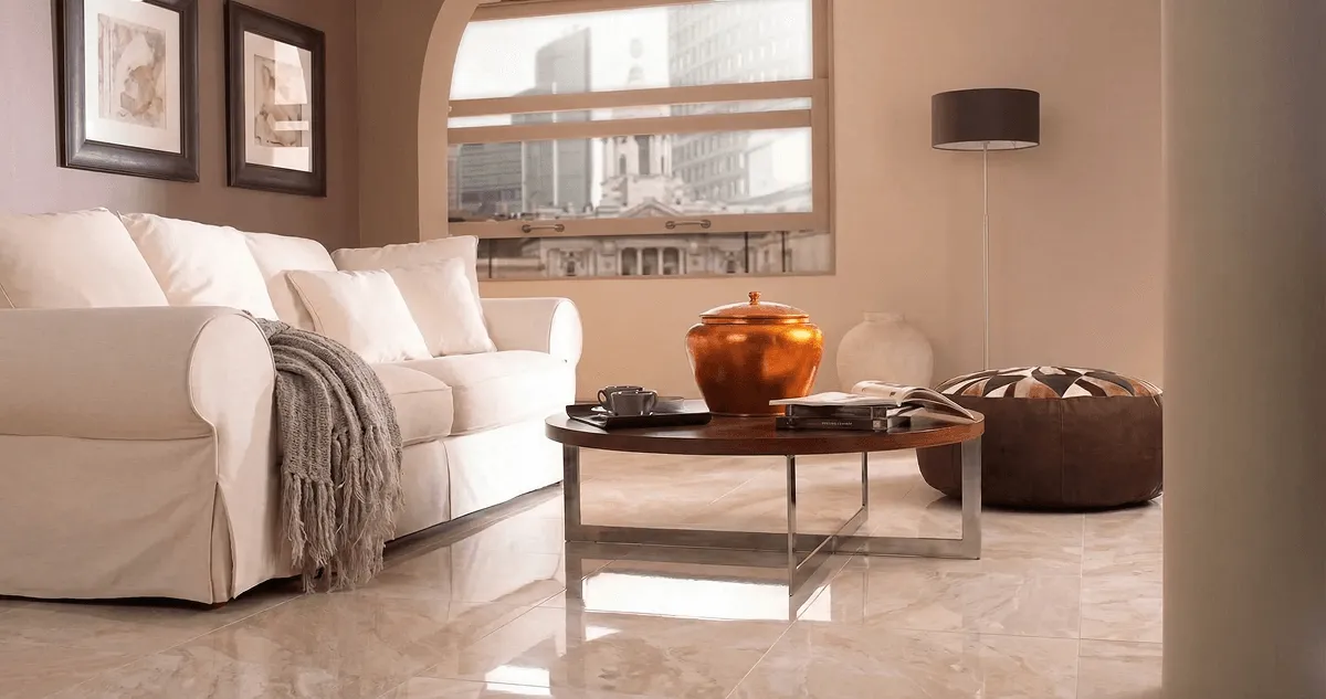 Modern living room with professionally installed marble flooring, a beige sofa, coffee table in Gilbert, AZ