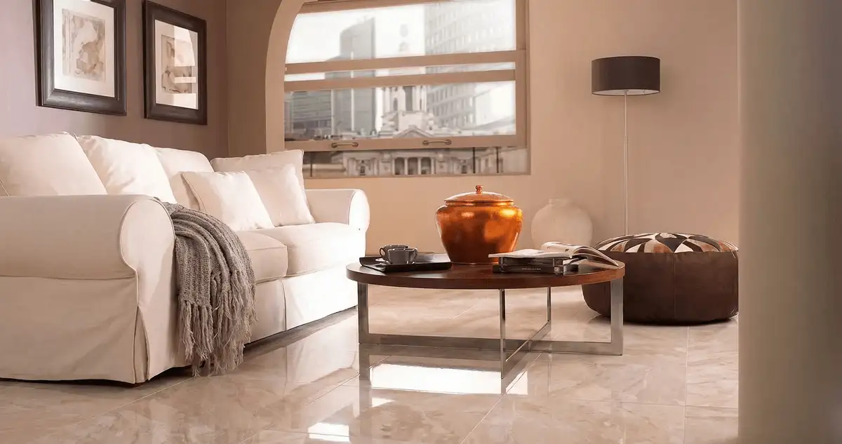 Modern living room with professionally installed marble flooring, a beige sofa, coffee table in Gilbert, AZ