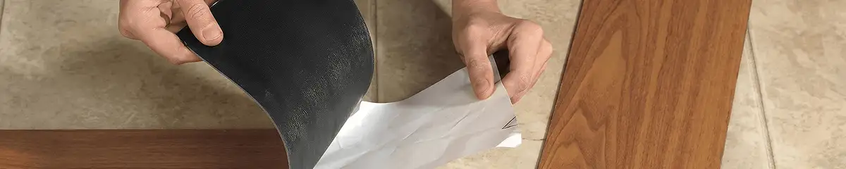 A professional installing vinyl flooring in Gilbert, AZ